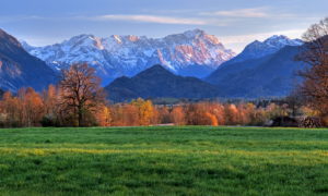 Alpine foothills against Zugspitzgruppe (2962m) in the evening sun, Ohlstadt, Das Blaue Land, Upper Bavaria, Bavaria, Germany Alpine foothills against Zugspitzgruppe (2962m) in the evening sun, Ohlstadt, Das Blaue Land, Upper Bavaria, Bavaria, Germany